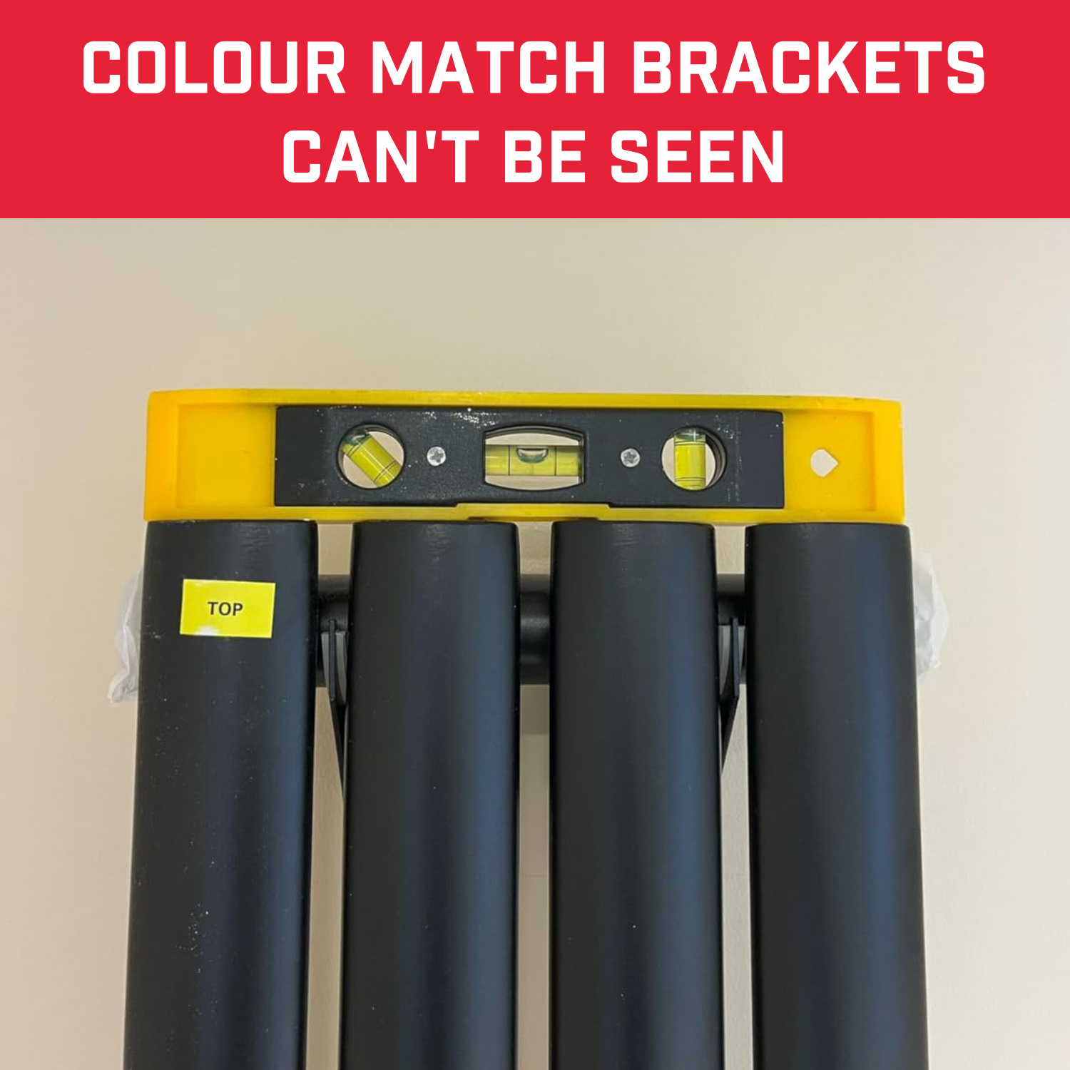The brackets are barely seen behind the radiator. The two common coloured brackets blend in with the radiator