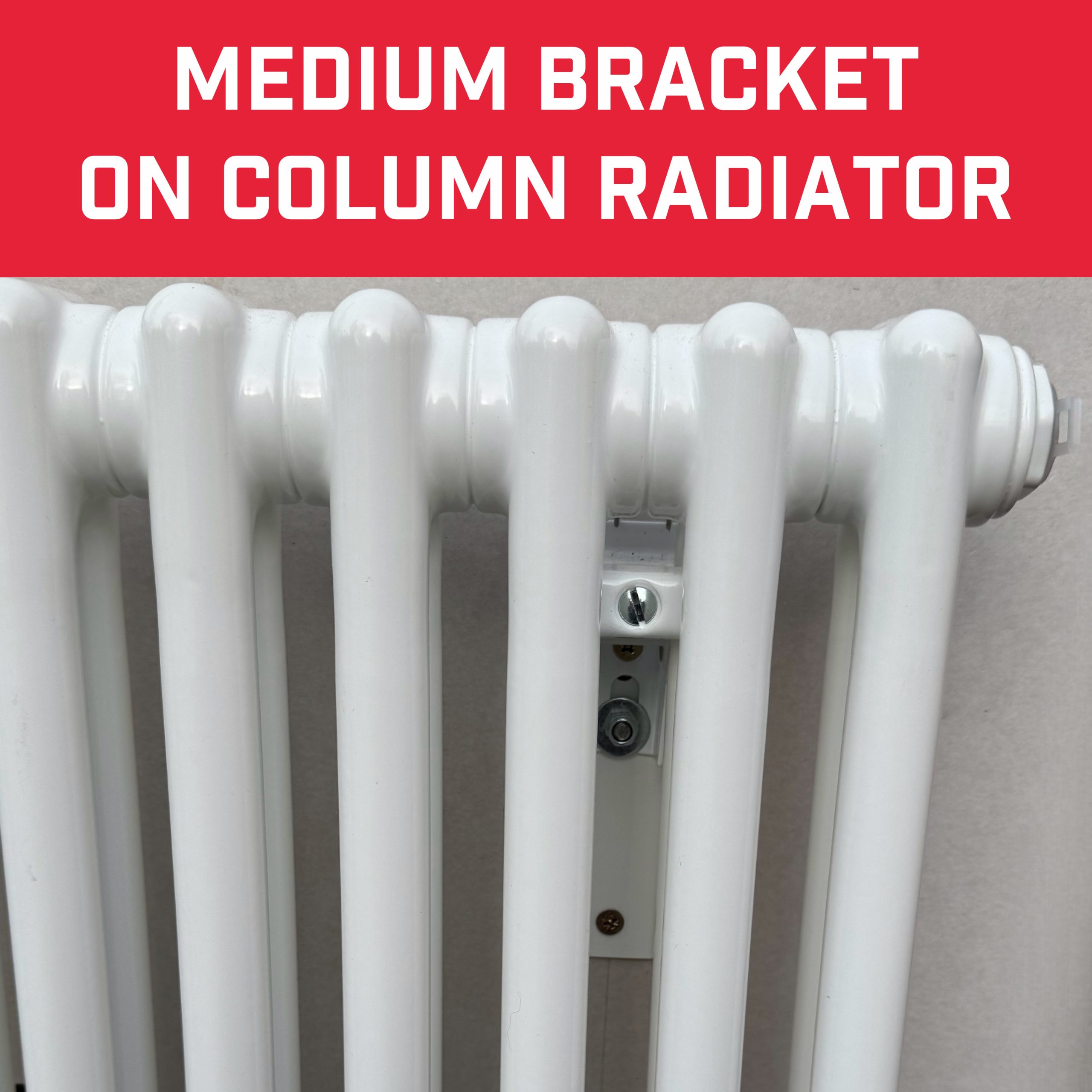 Medium duty white radiator brackets behind a white column radiator showing how discrete they are
